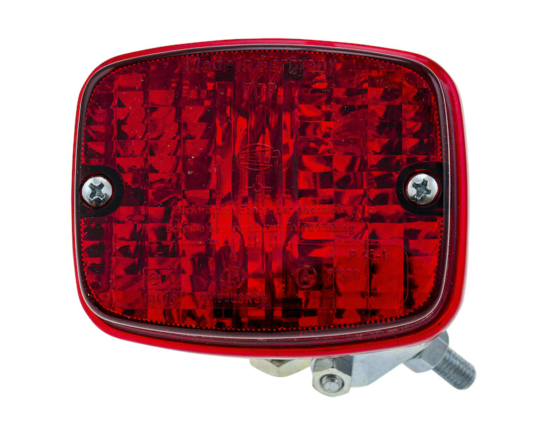 Chrome fog light with mounting hardware from Hella part number 003030151