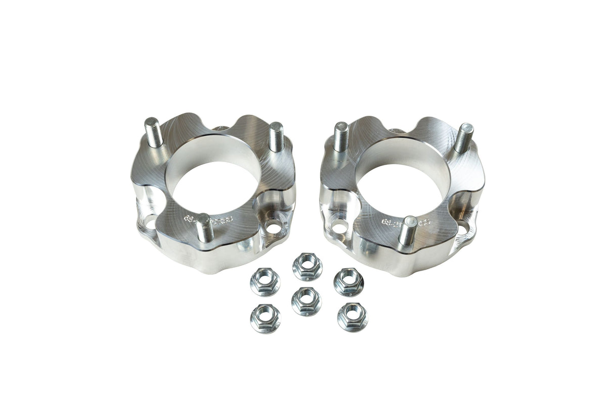 Machined billet aluminum suspension leveling kit from ReadyLift part number 66-24200