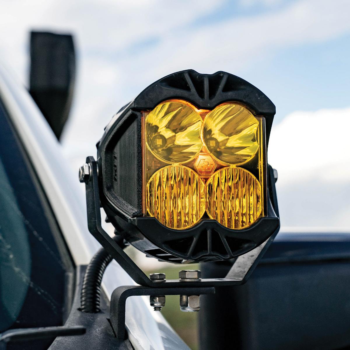 Black auxiliary light cover from Baja Designs part number 299208