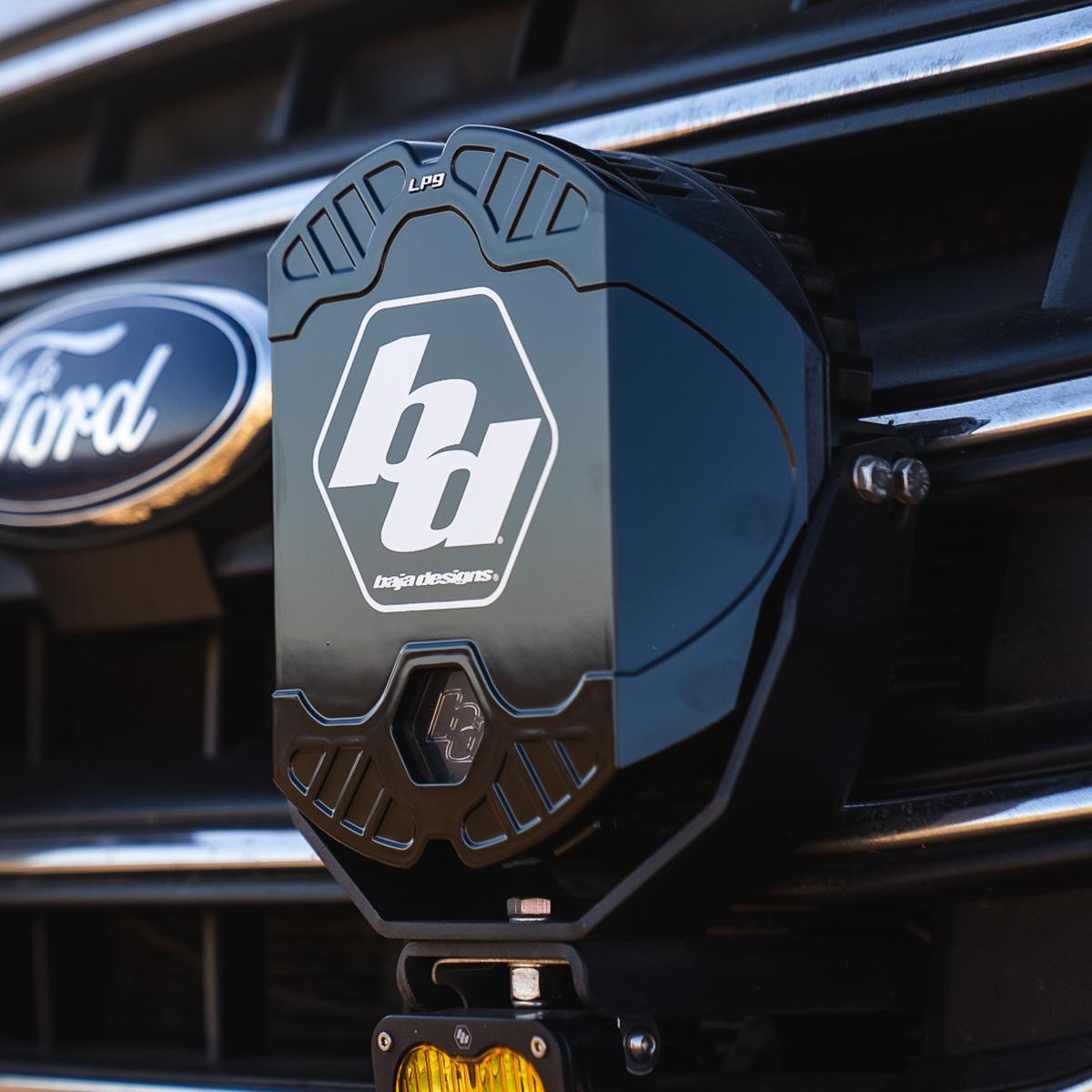 Black auxiliary light cover from Baja Designs part number 328001