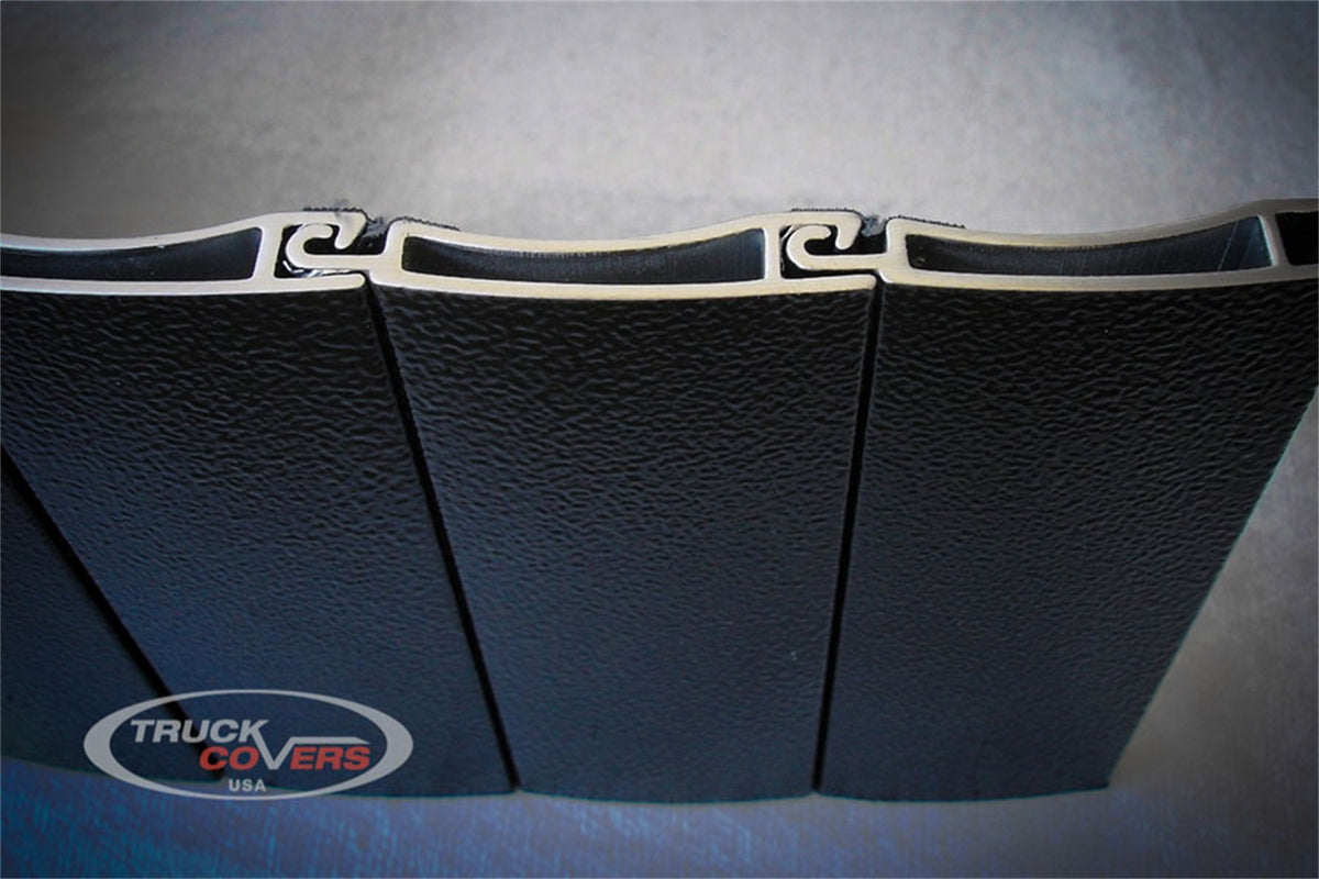 Black textured powder coated aluminum tonneau cover from Truck Covers USA part number CR142