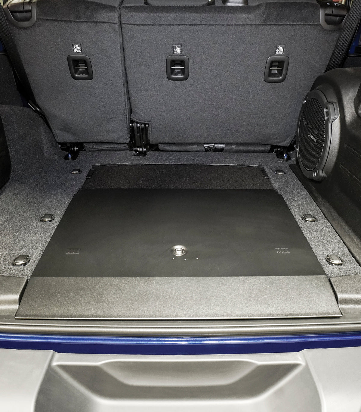 Black floor storage compartment lid from Tuffy Security Products part number 358-01-A