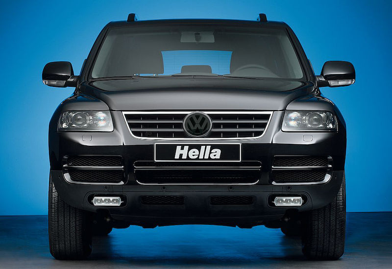Crystal clear daytime running light with mounting hardware from Hella part number 009496801