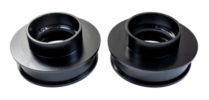 Black coil spring spacer from ReadyLift part number 26-54200
