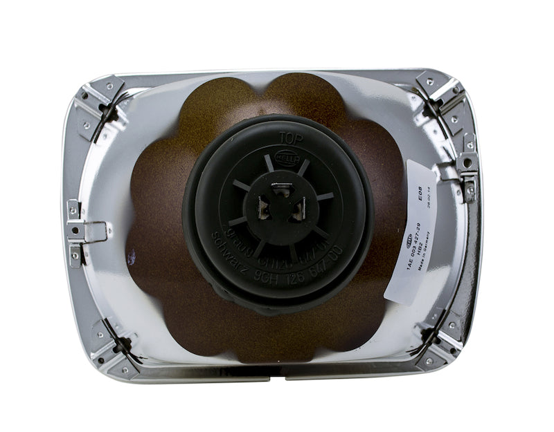 Chrome / black headlight from Hella part number 003427291