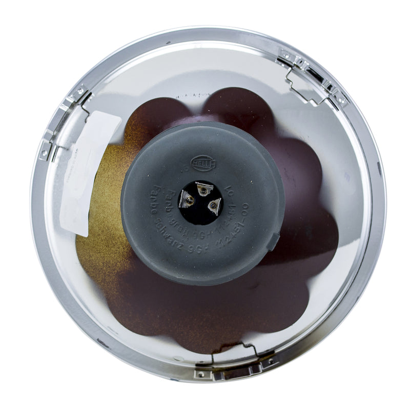Chrome / black headlight from Hella part number 002395301