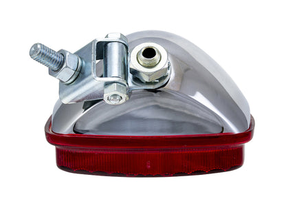 Chrome fog light with mounting hardware from Hella part number 003030151