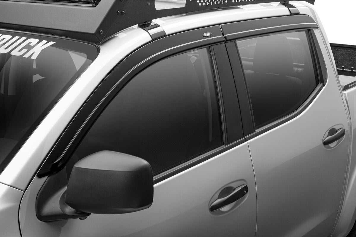 Smoke modified acrylic side window deflector from Husky Liners part number 2854113