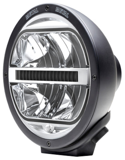 Black auxiliary light from Hella part number 016560101