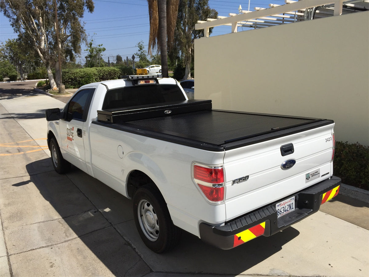 Black textured powder coated aluminum/steel tonneau cover tool box from Truck Covers USA part number CRT166