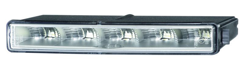 Crystal clear daytime running light with mounting hardware from Hella part number 010043801