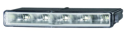 Crystal clear daytime running light with mounting hardware from Hella part number 010043801