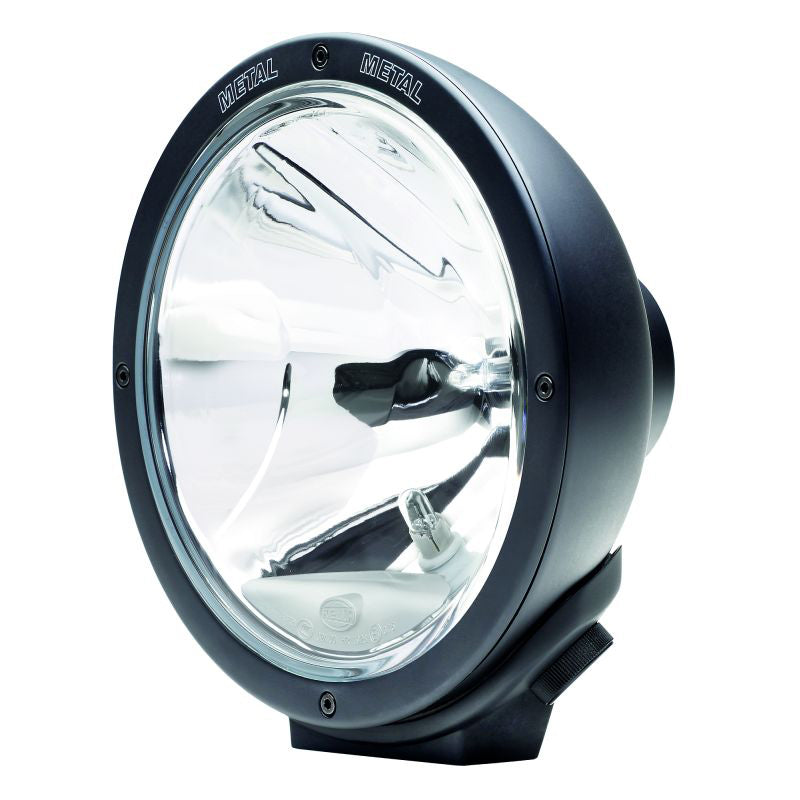 Black driving light with mounting hardware from Hella part number 007560361