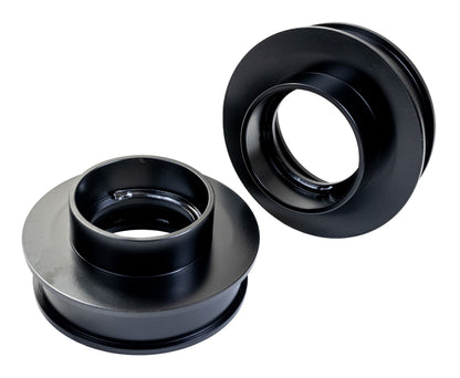 Black coil spring spacer from ReadyLift part number 26-54200