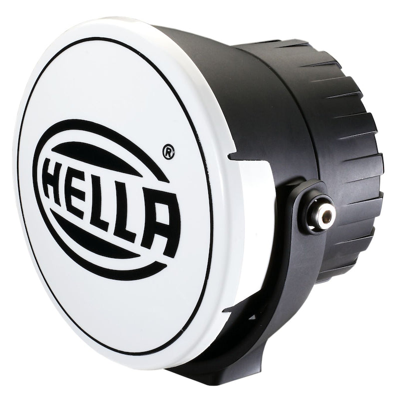 Black driving light with mounting hardware from Hella part number 009094331