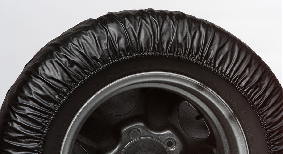 Black spare tire cover from Covercraft part number ST3001BK