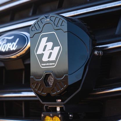 Black auxiliary light cover from Baja Designs part number 328001