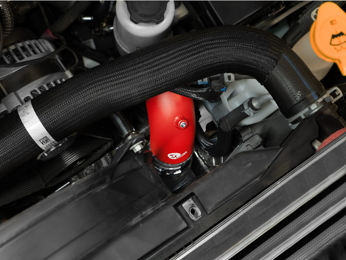 Red powdercoated aluminium intercooler pipe with mounting hardware from aFe Power part number 46-20814-R