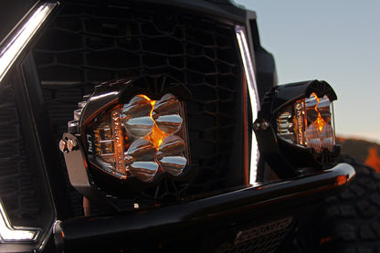 Black auxiliary light with mounting hardware from Baja Designs part number 297813