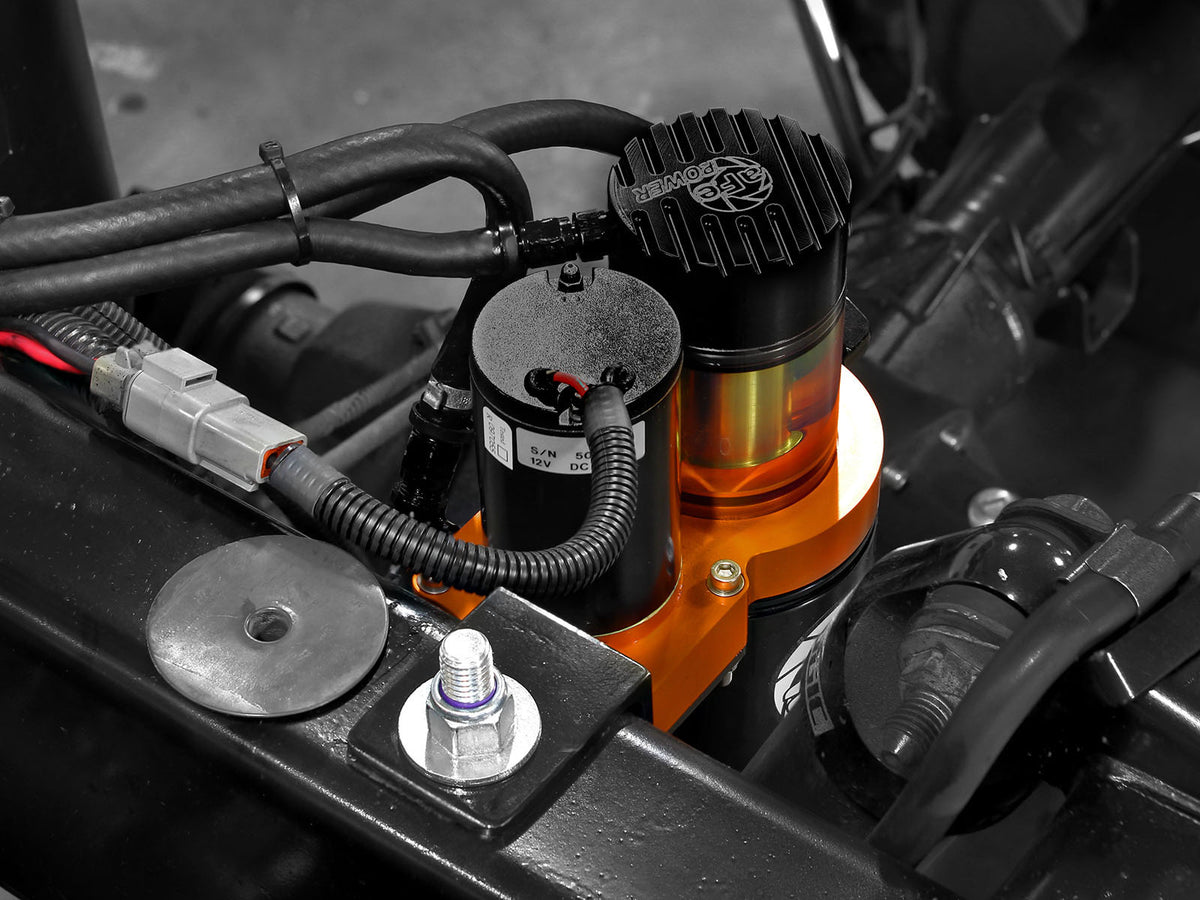 Black & orange anodized 6061-t6 aluminum electric fuel pump from aFe Power part number 42-13022