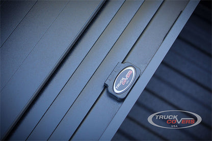 Black textured powder coated aluminum tonneau cover from Truck Covers USA part number CR204-A