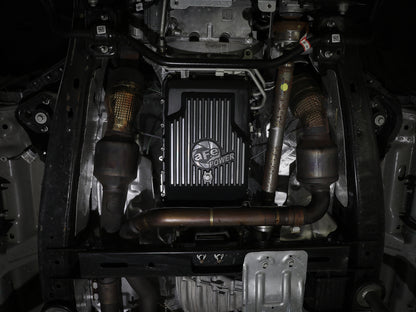Black powdercoated cast aluminum transmission oil pan with mounting hardware from aFe Power part number 46-71330B