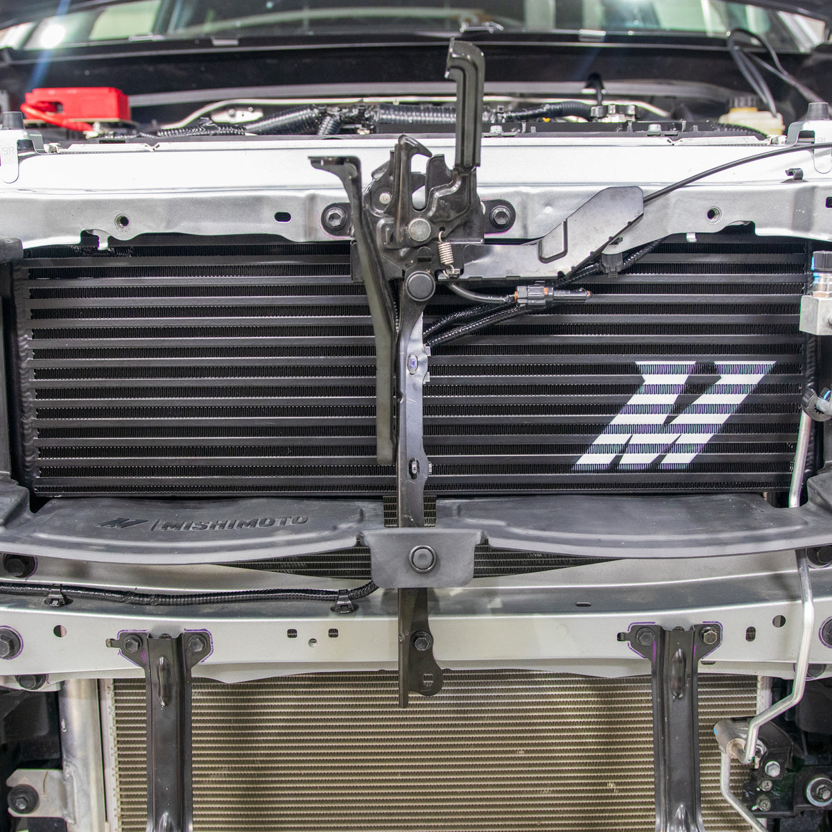 Intercooler from Mishimoto part number MMINT-TAC-24SL