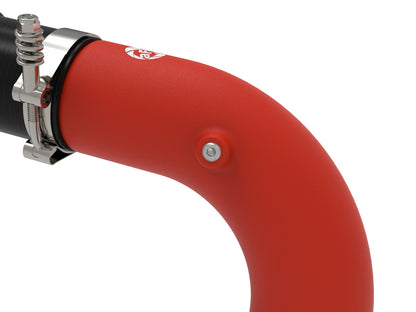 Red powdercoated aluminium intercooler pipe with mounting hardware from aFe Power part number 46-20814-R