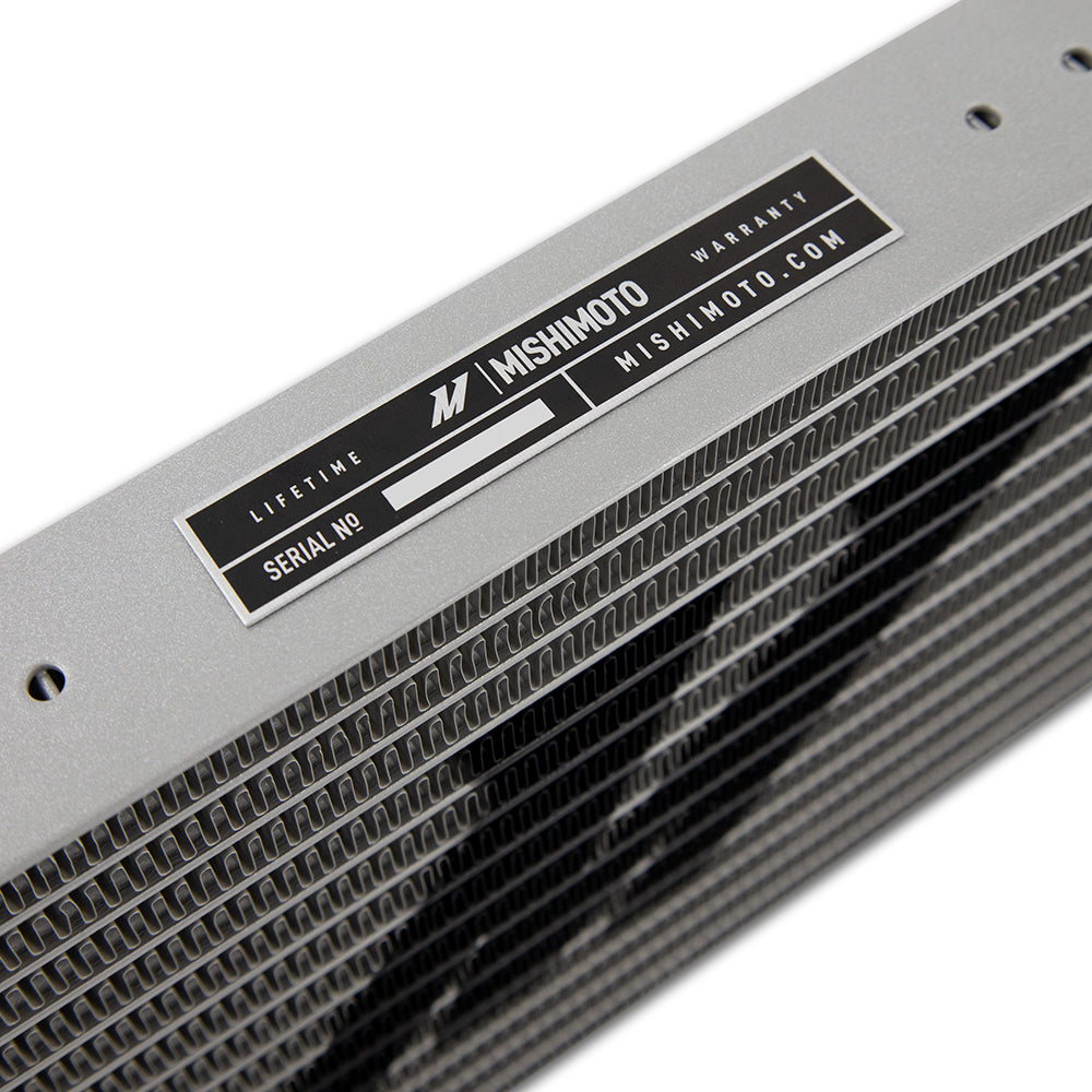 Natural aluminum automatic transmission oil cooler with mounting hardware from Mishimoto part number MMTC-DMAX-17SL