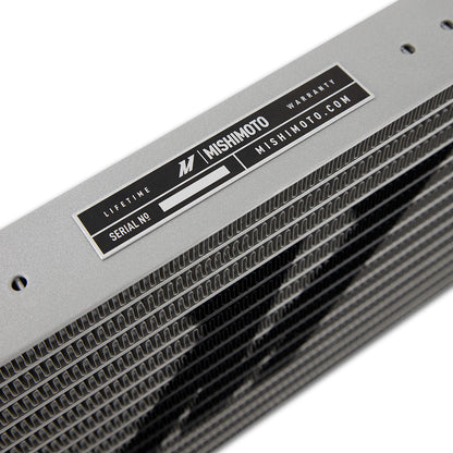 Natural aluminum automatic transmission oil cooler with mounting hardware from Mishimoto part number MMTC-DMAX-17SL