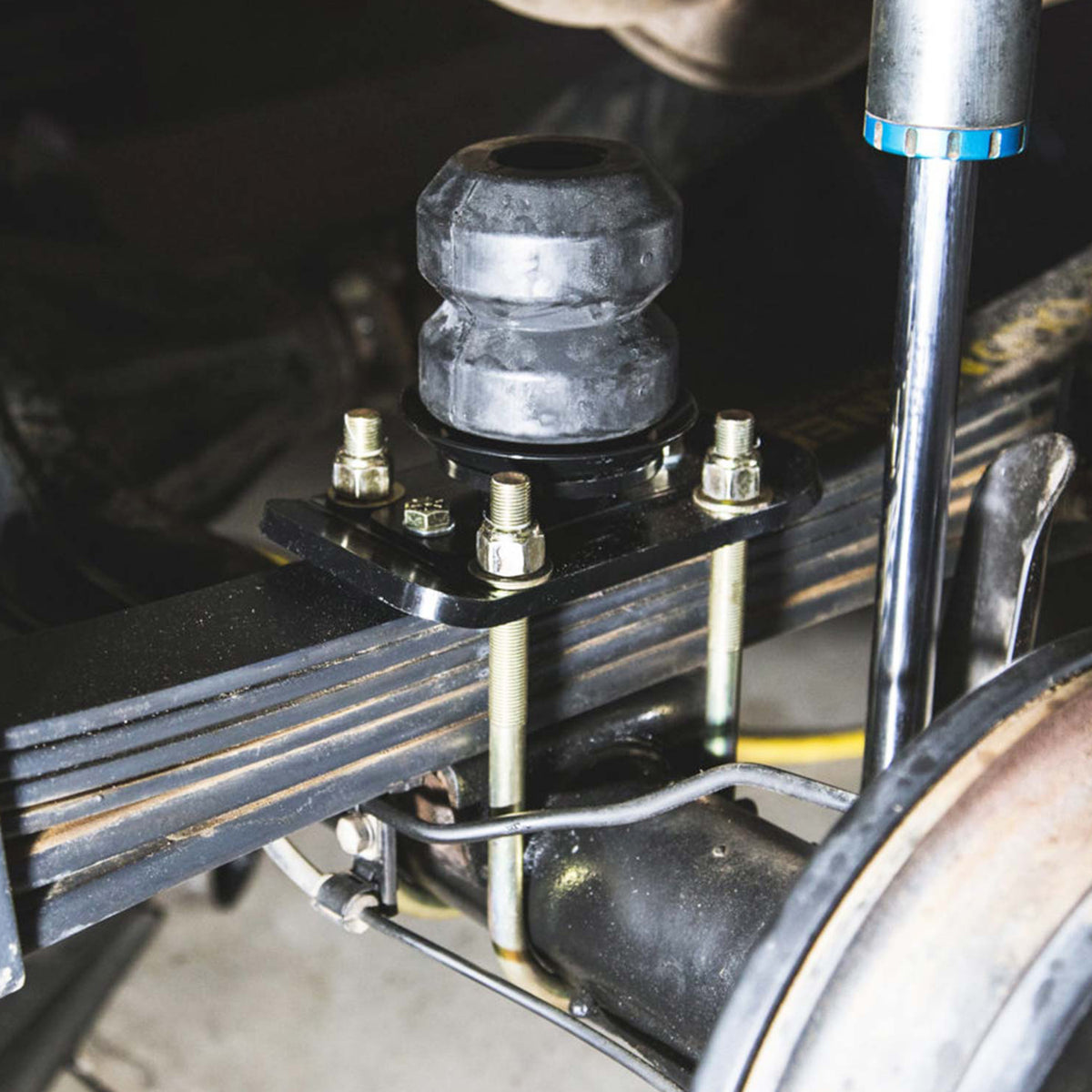 Black rubber suspension bump stop kit with mounting hardware from Timbren part number ABSTRFK